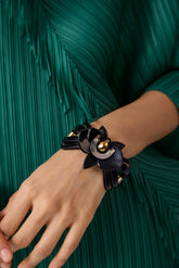 M leather women's black-gold with distinctive orchid-link metal bracelet